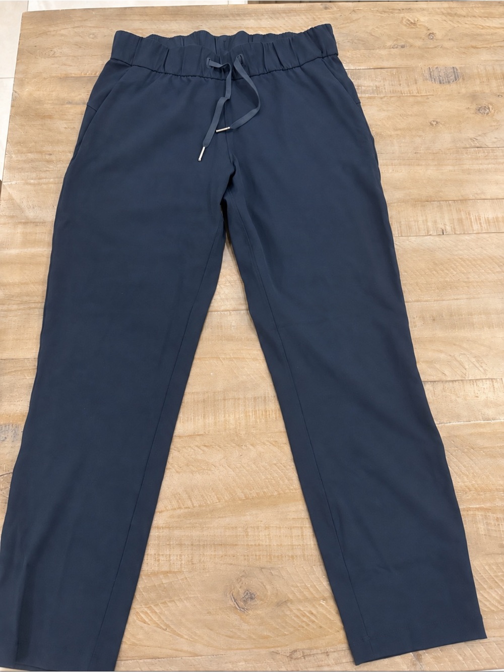 Lululemon navy performance pants with a sleek, versatile design and comfortable